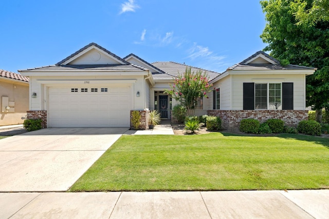 11901 Kimelford Dr, Bakersfield, CA 93312 - single story home with a garage, a front yard, brick siding, driveway, and a tile roof