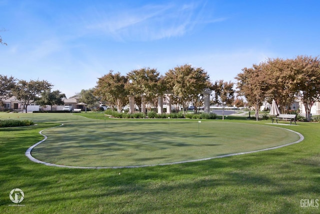11901 Kimelford Dr, Bakersfield, CA 93312 - view of property's community with a lawn and a putting green