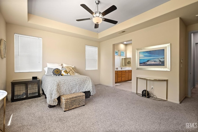 11901 Kimelford Dr, Bakersfield, CA 93312 - bedroom with light carpet, a raised ceiling, and ensuite bathroom