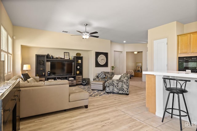 11901 Kimelford Dr, Bakersfield, CA 93312 - living area with light wood-style floors and a ceiling fan