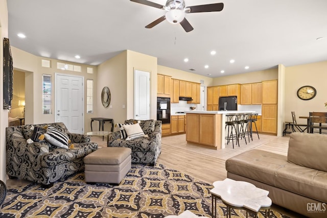 11901 Kimelford Dr, Bakersfield, CA 93312 - living room featuring a ceiling fan, light wood finished floors, and recessed lighting