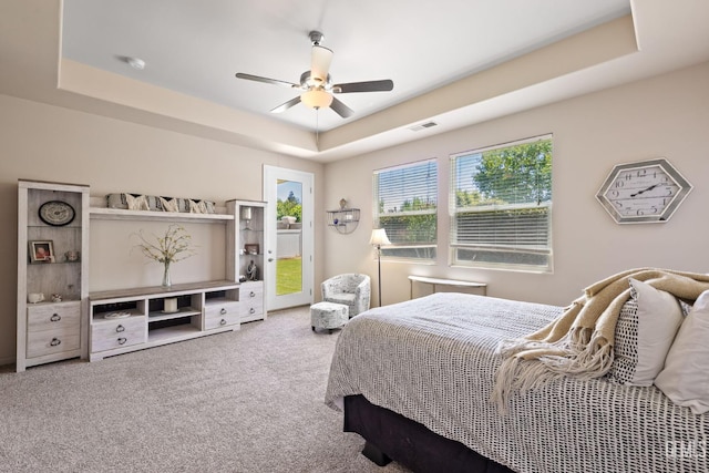 11901 Kimelford Dr, Bakersfield, CA 93312 - carpeted bedroom with a tray ceiling, access to outside, and a ceiling fan