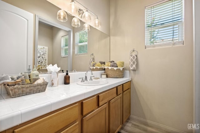 11901 Kimelford Dr, Bakersfield, CA 93312 - bathroom featuring vanity and wood finished floors