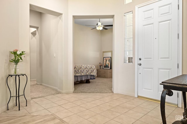 11901 Kimelford Dr, Bakersfield, CA 93312 - entryway featuring light carpet, a ceiling fan, and light tile patterned flooring
