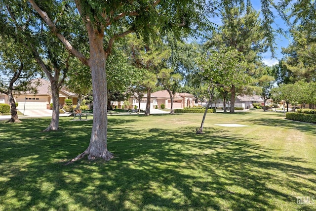 11901 Kimelford Dr, Bakersfield, CA 93312 - view of community with a lawn and a residential view