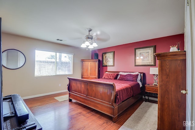 10126 Pyramid Peak Dr, Bakersfield, CA 93311 - bedroom with wood finished floors and a ceiling fan