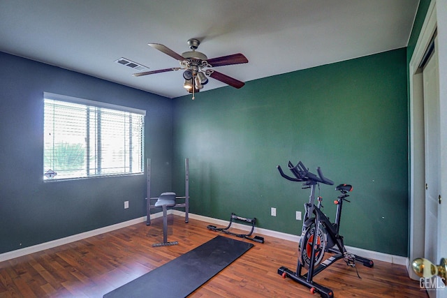 10126 Pyramid Peak Dr, Bakersfield, CA 93311 - workout room featuring a ceiling fan and wood finished floors
