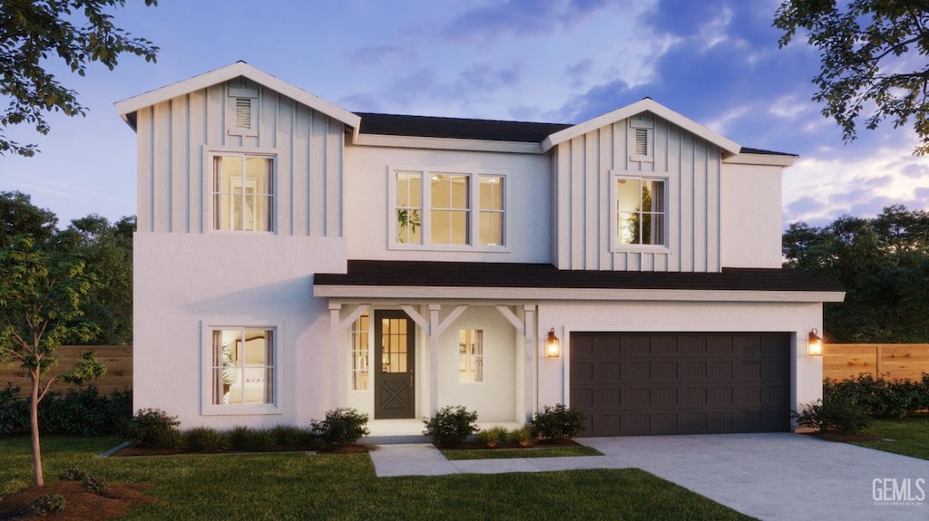 view of front of house featuring board and batten siding, driveway, and a garage