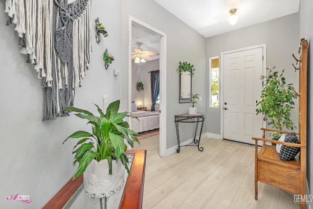 13918 Calico Village Dr, Bakersfield, CA 93306 - foyer entrance with light wood-style floors and baseboards