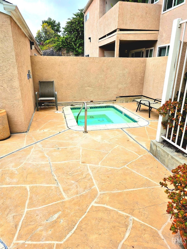 10026 Maya Linda Rd Unit 6101, San Diego, CA 92126 - view of swimming pool featuring an in-ground hot tub, a patio area, and a pool