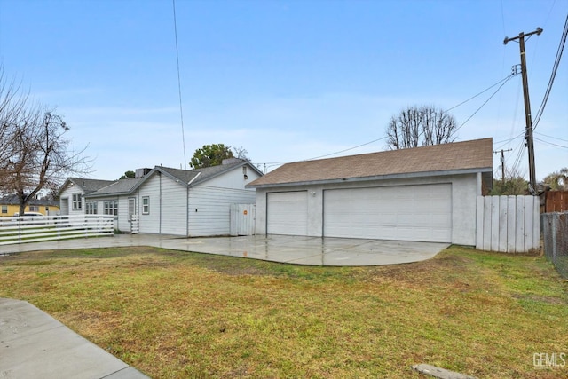 garage with a lawn