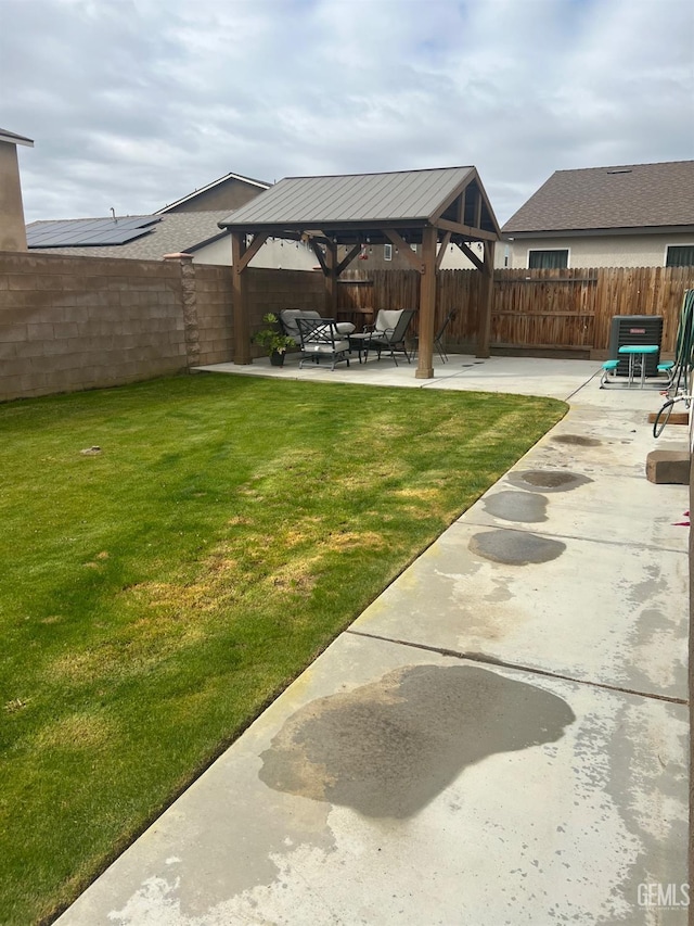 view of yard with a patio area, a fenced backyard, cooling unit, and a gazebo