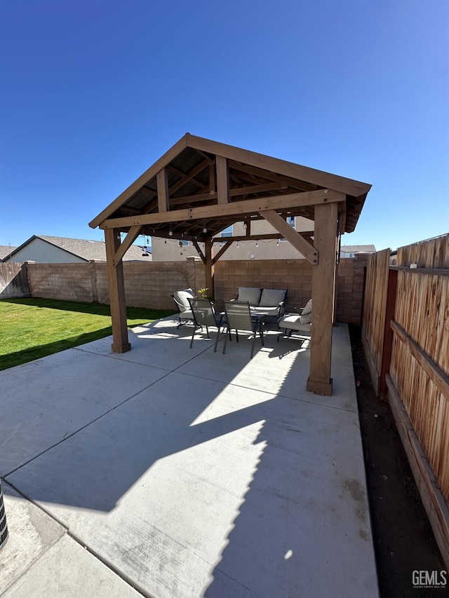 view of patio / terrace with a gazebo and a fenced backyard