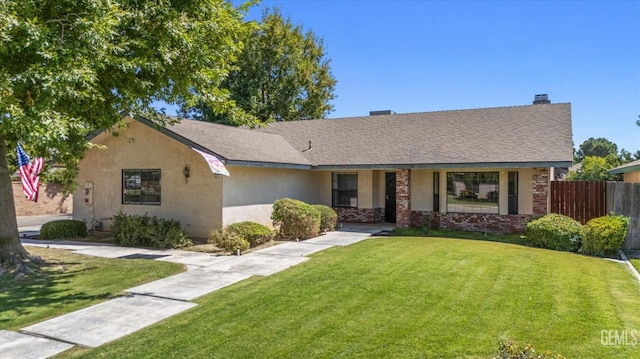 view of front of home with a front lawn