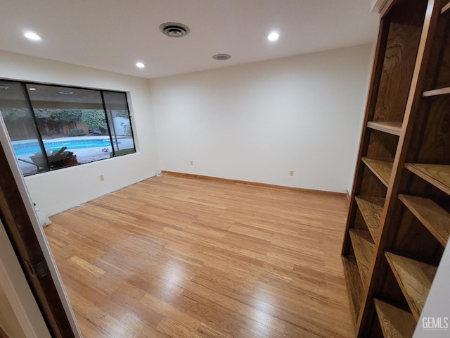 6918 Crestwood St, Bakersfield, CA 93308 - unfurnished room featuring light wood-style floors and recessed lighting