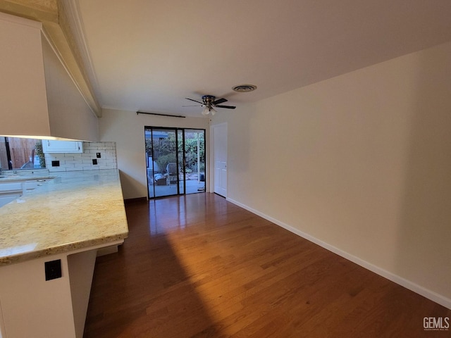 6918 Crestwood St, Bakersfield, CA 93308 - unfurnished living room featuring dark wood finished floors and ceiling fan