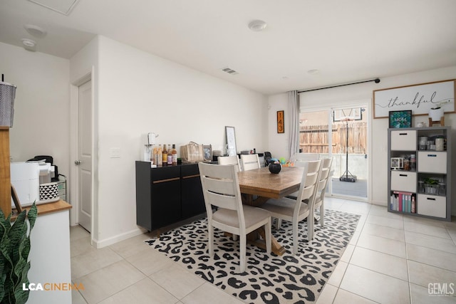 dining room featuring light tile patterned flooring