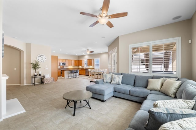 5703 Park Pl, Bakersfield, CA 93306 - living room with a ceiling fan, plenty of natural light, light tile patterned floors, and recessed lighting