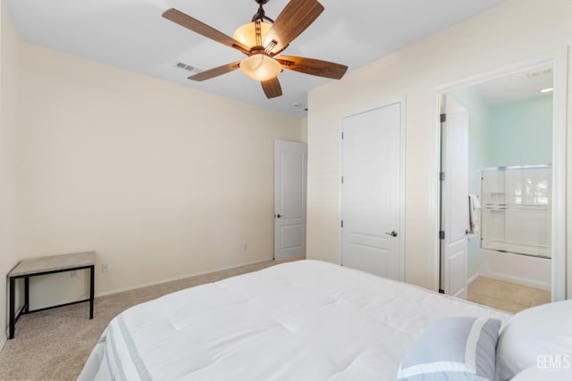 5703 Park Pl, Bakersfield, CA 93306 - bedroom with carpet floors, ensuite bath, and ceiling fan