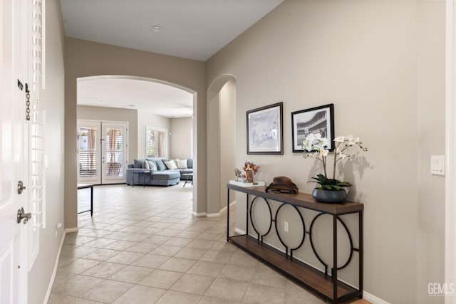 5703 Park Pl, Bakersfield, CA 93306 - corridor featuring arched walkways and light tile patterned floors