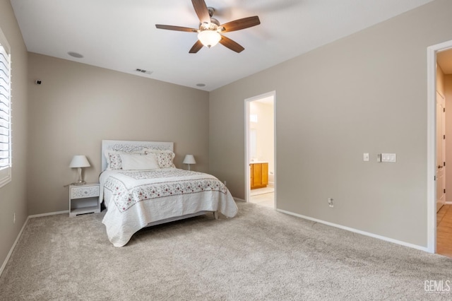 5703 Park Pl, Bakersfield, CA 93306 - bedroom featuring light carpet, ensuite bath, and a ceiling fan