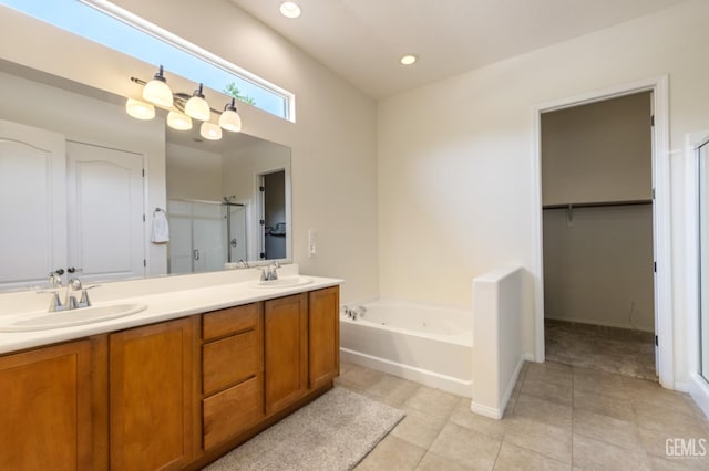 5703 Park Pl, Bakersfield, CA 93306 - full bath with a shower stall, a bath, double vanity, tile patterned flooring, and recessed lighting