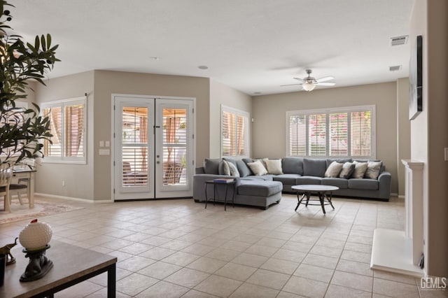 5703 Park Pl, Bakersfield, CA 93306 - living area with a ceiling fan, light tile patterned floors, and french doors