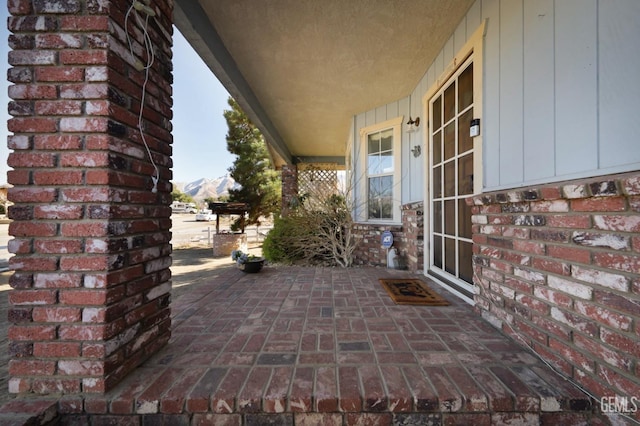 view of patio / terrace featuring a mountain view