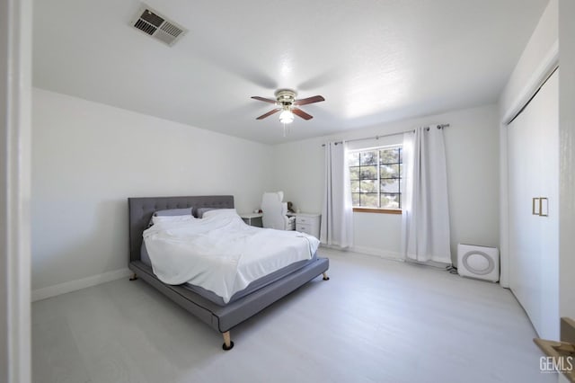 bedroom featuring light wood-type flooring and ceiling fan