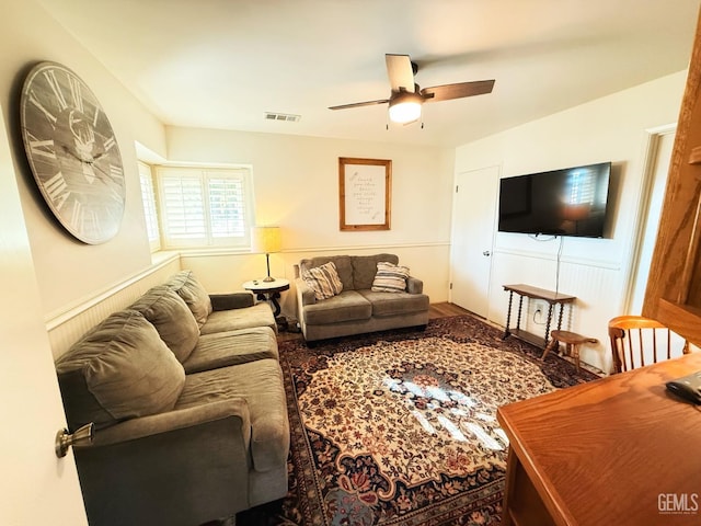 living room featuring ceiling fan