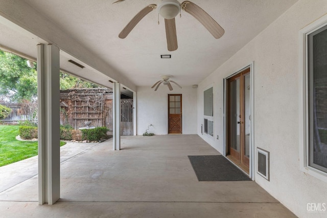 view of patio / terrace featuring fence