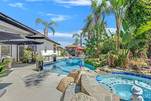11915 Fessler Ln, Bakersfield, CA 93311 - pool with a patio and an in ground hot tub