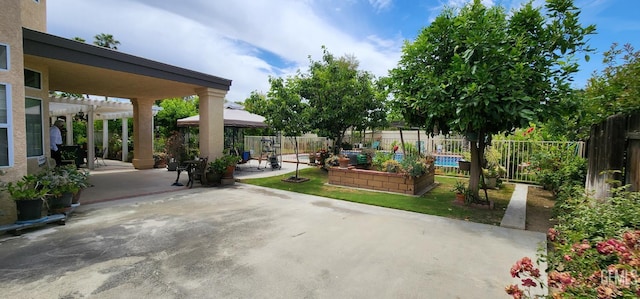 2013 Calle, Los Camichines, Bakersfield, CA 93309 - view of patio / terrace featuring a gazebo, a fenced backyard, and a pergola