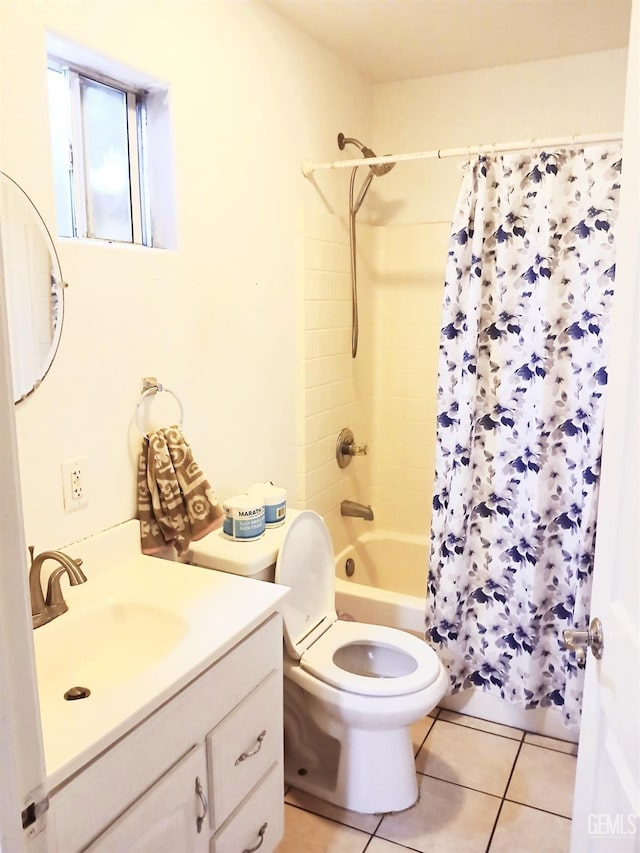 full bathroom featuring tile patterned floors, vanity, toilet, and shower / tub combo