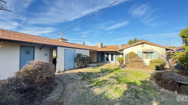 ranch-style house with a front yard