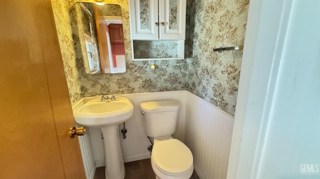 bathroom featuring toilet