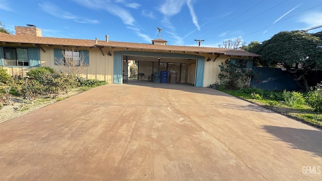 view of front of house featuring a carport