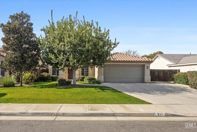 view of property hidden behind natural elements with a front lawn and a garage