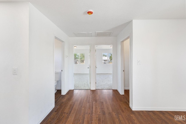 438 Cedar Ave, Earlimart, CA 93219 - hallway with baseboards and wood finished floors