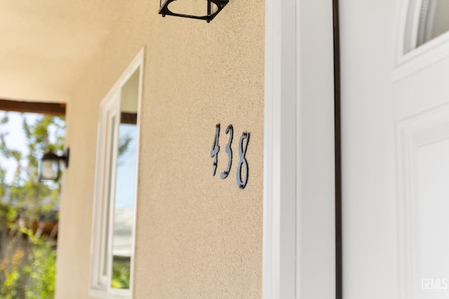 438 Cedar Ave, Earlimart, CA 93219 - exterior view of stucco siding