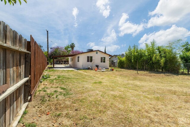 438 Cedar Ave, Earlimart, CA 93219 - view of yard with a patio