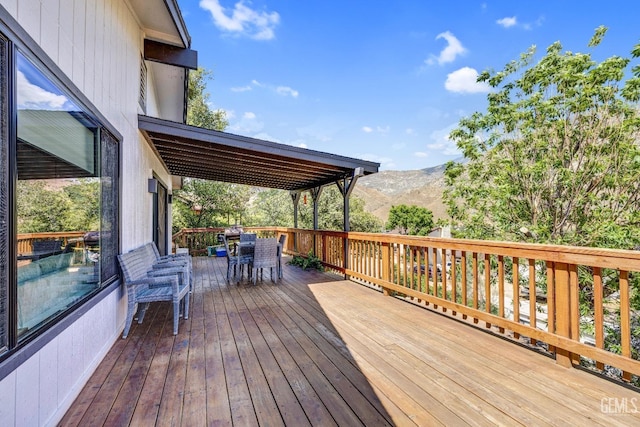 deck featuring a mountain view