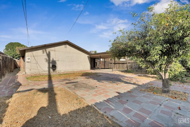1929 Belmont St, Delano, CA 93215 - rear view of house with a patio area