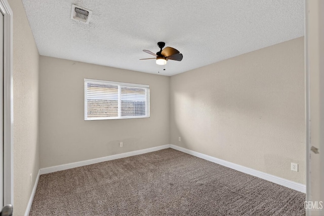 1929 Belmont St, Delano, CA 93215 - unfurnished room with ceiling fan, carpet floors, a textured ceiling, and baseboards