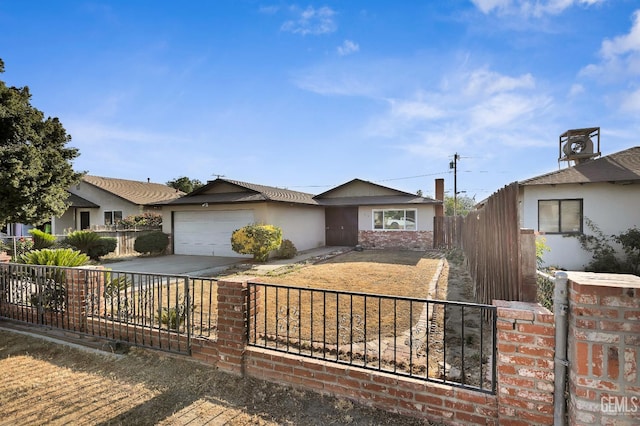 1929 Belmont St, Delano, CA 93215 - ranch-style house with a garage and stucco siding