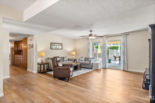 601 Vista Verde Way, Bakersfield, CA 93309 - living area featuring a textured ceiling, ceiling fan, and light wood finished floors