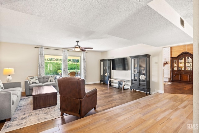 601 Vista Verde Way, Bakersfield, CA 93309 - living room with a textured ceiling, wood-type flooring, and a ceiling fan
