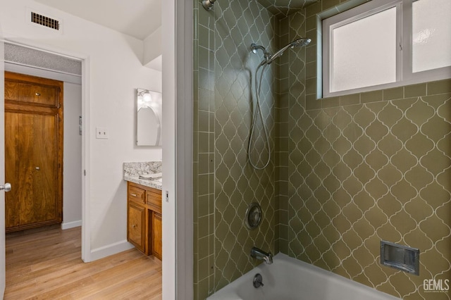 601 Vista Verde Way, Bakersfield, CA 93309 - full bathroom with vanity, wood finished floors, and shower / washtub combination