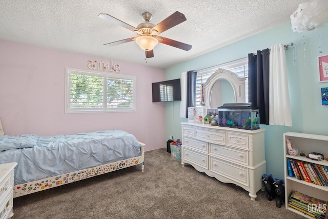 601 Vista Verde Way, Bakersfield, CA 93309 - carpeted bedroom featuring multiple windows, a textured ceiling, and a ceiling fan
