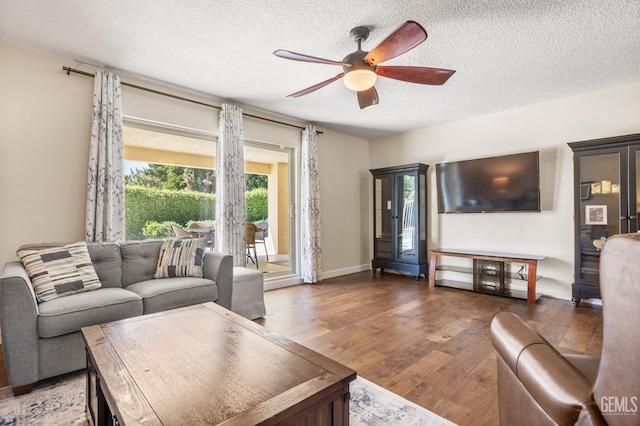 601 Vista Verde Way, Bakersfield, CA 93309 - living area with ceiling fan, plenty of natural light, wood finished floors, and a textured ceiling